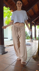 Woman dances, takes selfies in Mũi Né outdoor area