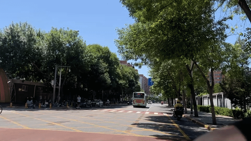 Morning traffic observed on marked road in Beijing suburb