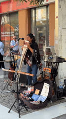 Street musician performs pan flute in Plovdiv, Bulgaria