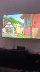 Animated cartoon with yellow creature viewed on TV in Enugu