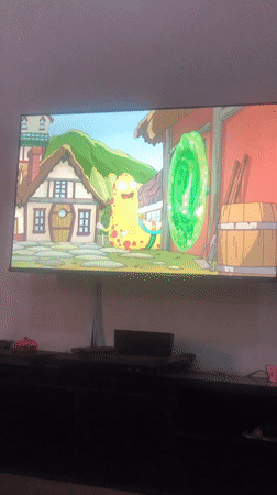Animated cartoon with yellow creature viewed on TV in Enugu