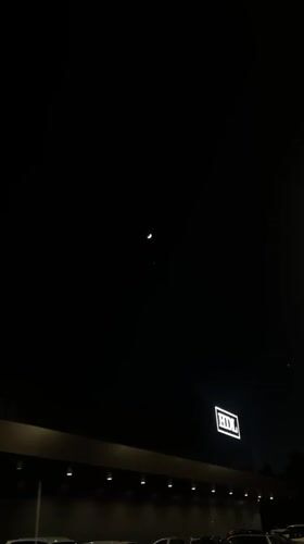 Crescent moon and celestial object observed over Podgorica