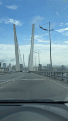 Morning traffic crosses cable-stayed bridge in Vladivostok