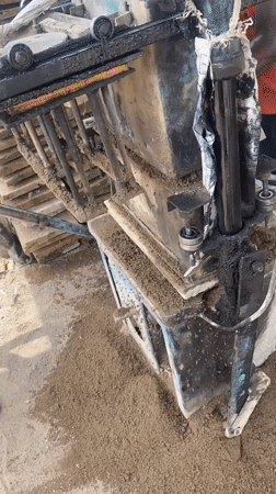 Man operates block-making machine in Markurdi, Nigeria