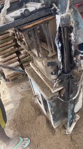 Man operates block-making machine in Markurdi, Nigeria