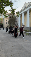 Taiko drumming group performs outdoors in Bishkek public space