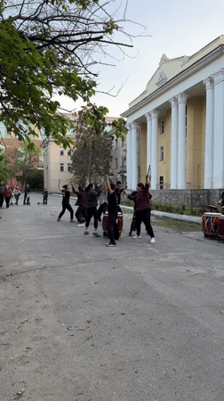 Taiko drumming group performs outdoors in Bishkek public space