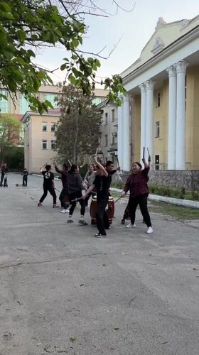 Taiko drumming group performs outdoors in Bishkek public space