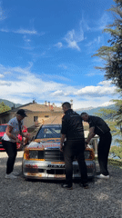 Race car maintenance observed in Como residential area