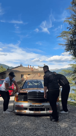Race car maintenance observed in Como residential area