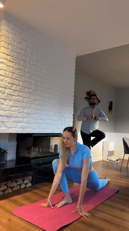 Home yoga session with dog documented in Carnikava