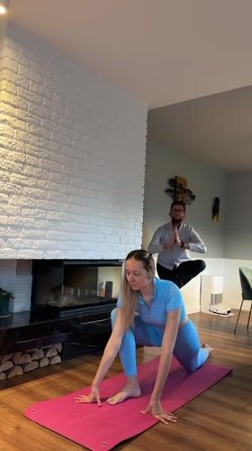 Home yoga session with dog documented in Carnikava