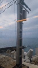 Train passenger films Black Sea coastal views near Sochi