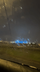 Rainy night drive past Gazprom Arena in Saint Petersburg