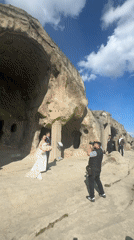 Wedding photo shoot captured at Georgian rock formation