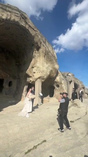 Wedding photo shoot captured at Georgian rock formation