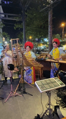 Traditional Vietnamese musicians perform outdoors in Đà Nẵng