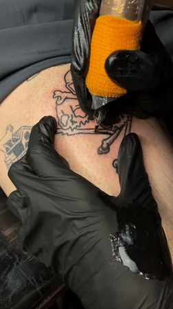 Late-night tattoo session documented in Ushuaia, Argentina