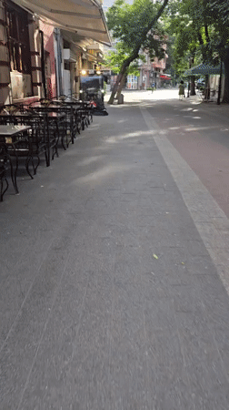 Early morning street cleaning and casual moments in Plovdiv