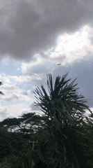 Solar equipment setup underway on a grassy site in Lagos suburbs