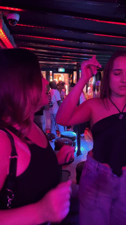 Friday night out at a neon-lit Paris club