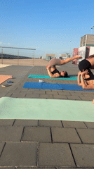 Outdoor yoga, street workouts, and morning coffee on a waterfront promenade