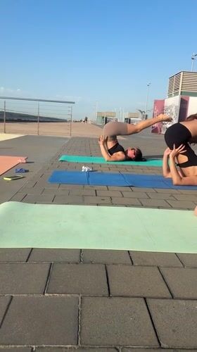 Outdoor yoga, street workouts, and morning coffee on a waterfront promenade