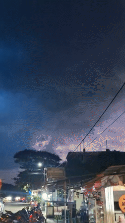 Daily life documented across Lhokseumawe during morning storm