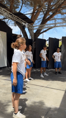 Staff performance event with dance routines in Isola delle Femmine