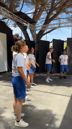Staff performance event with dance routines in Isola delle Femmine