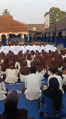 Students gathered in school courtyard for outdoor assembly, Cianjur