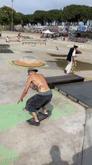 Skateboarders practice tricks at Barcelona skatepark Saturday afternoon