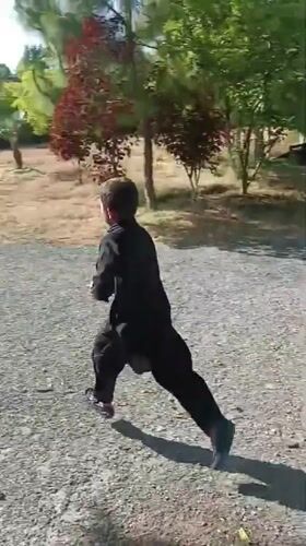 Child plays with balls in Pakistani village yards