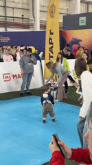 Toddlers compete in indoor race at convention center event