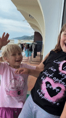 Family enjoys afternoon playtime on Sochi oceanfront patio