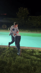 Nighttime wrestling match ends with splash in Palaiseau pool
