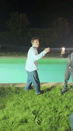 Nighttime wrestling match ends with splash in Palaiseau pool