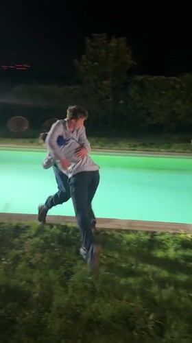Nighttime wrestling match ends with splash in Palaiseau pool