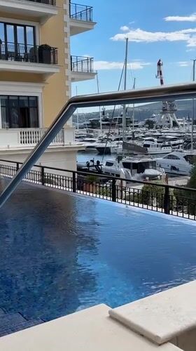 Luxury poolside scenes captured in Tivat yacht harbor
