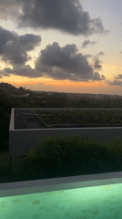 Dramatic sunset captured from poolside in Kuta Selatan, Indonesia