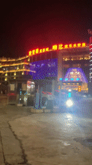 Nighttime street scenes documented in Jiulongpo District, China