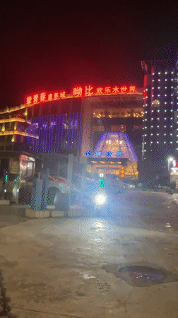 Nighttime street scenes documented in Jiulongpo District, China