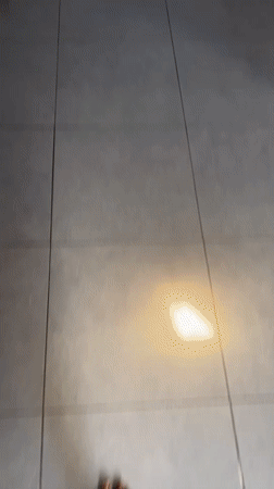 Person documented in casual indoor moments in Madiun home