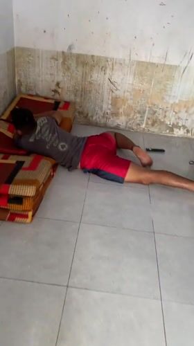 Person documented in casual indoor moments in Madiun home