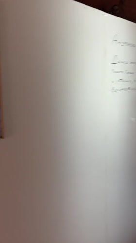 Writing on a whiteboard inside a Krasnoyarsk art tunnel