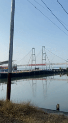 Kendari Bay waterfront: suspension bridge and Ferris wheel
