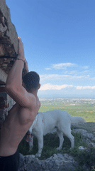 Group gathers at graffiti-covered overlook above Markovo, Bulgaria