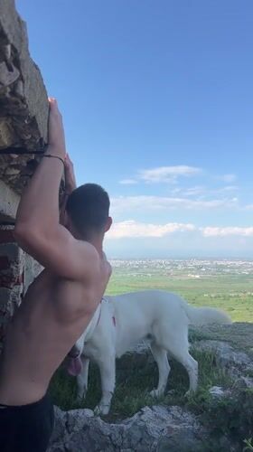 Group gathers at graffiti-covered overlook above Markovo, Bulgaria