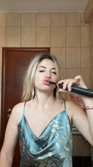 Woman documents morning dental routine in Budva bathroom selfie