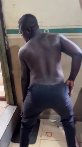Casual indoor gathering documented in Badagry home featuring sunglasses, food